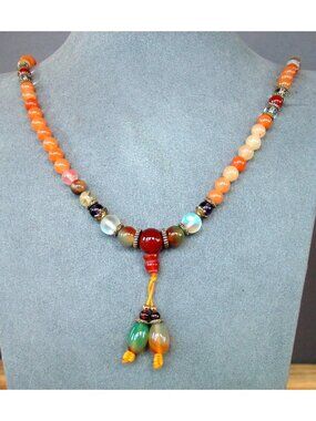 Multi-Stone Beaded Necklace With Dual Green-Tipped Tassel Drops